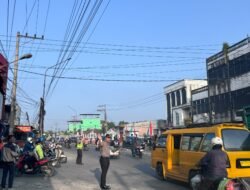 Senyum Pengendara dan Kelancaraan Aktivitas Warga, Kapolsek Sunggal Turun Langsung ke Jalan